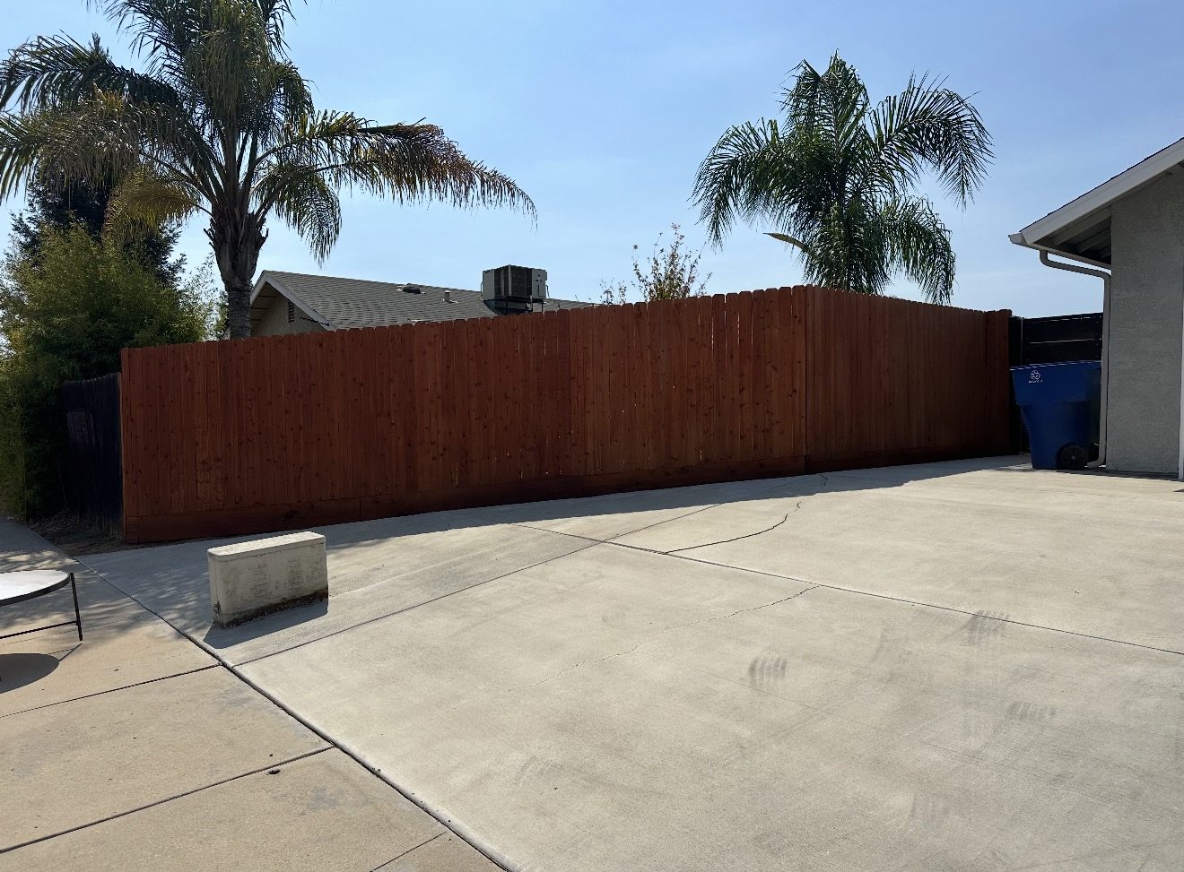 Same fence after staining and repair