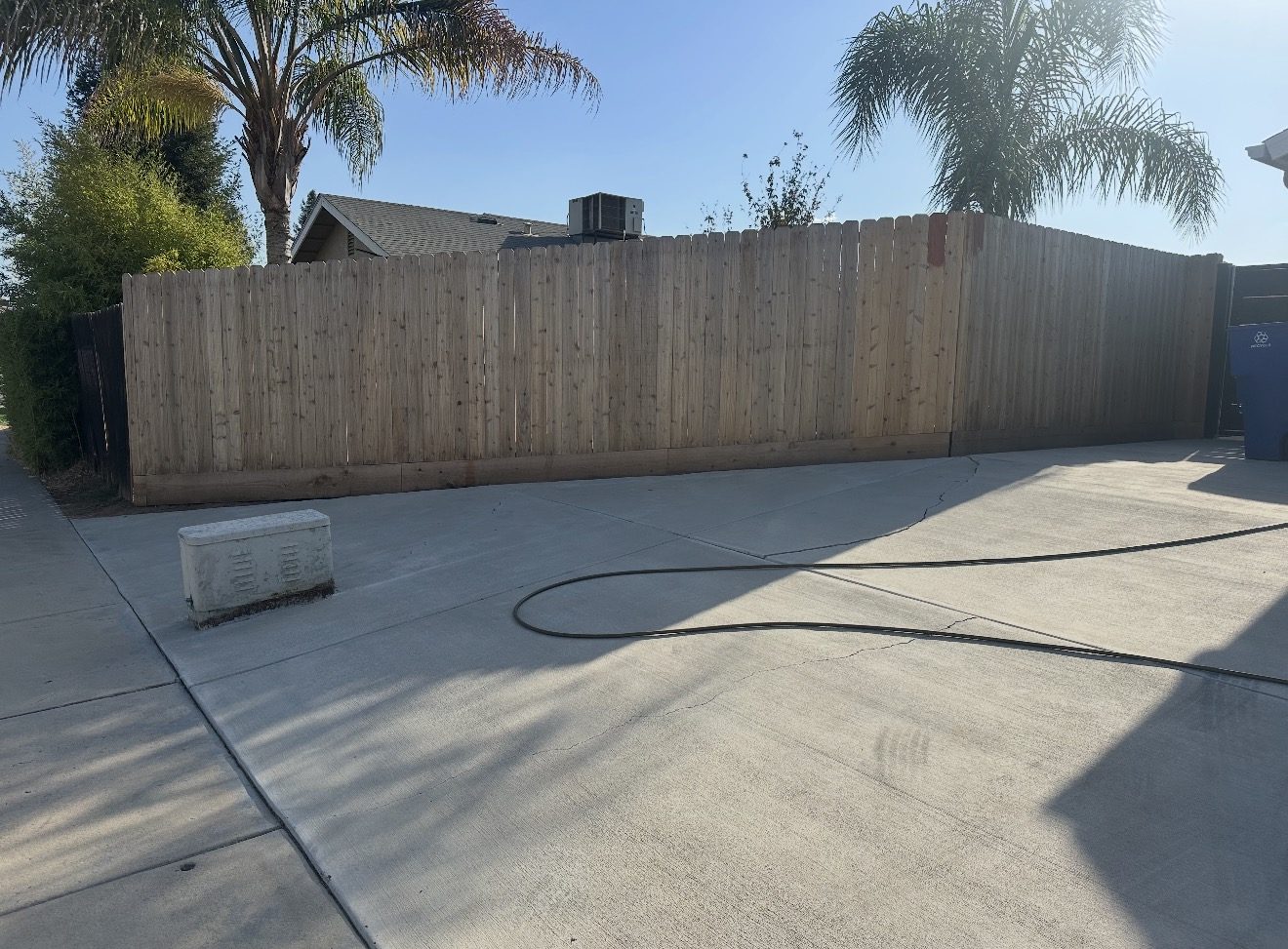 Backyard fence before refinishing